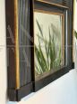 Antique Empire mirror, carved and lacquered in black and gold, Italy 19th century