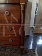 Antique Empire chest of drawers with half columns and gilded capitals