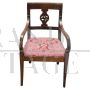 Antique Directoire armchair from the end of the 18th century in carved walnut