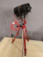 Small vintage cinema spotlight with tripod