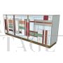 4-door sideboard in white glass with colored sections and brass 
