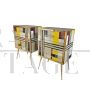 Pair of bedside tables in colored glass with geometric designs