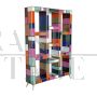 Open bookcase in wood covered in colored glass