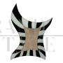Shaped mirror in black and white glass with LED lighting