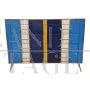 Dresser with 4 drawers covered in blue, white and yellow glass