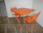 Industrial orange metal table and 2 chairs set, 1970s