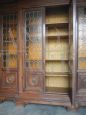 Vintage library bookcase with leaded glasses
