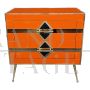 Art deco style bedside cabinet in orange glass with geometries