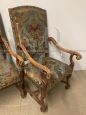 Pair of early 1900s antique armchairs in solid walnut and damask fabric