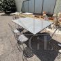 Garden set with 6 chairs and a large wrought iron table
