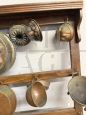 Antique 20th century plate rack with copper objects