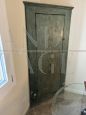 Antique Italian corner cabinet from the 17th century in green paint                            