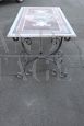 Iron garden table with marble top with mosaic decoration