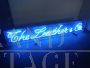 Vintage neon light sign, The Leather & Co.