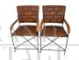 Pair of hand-crafted leather chairs