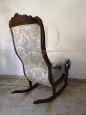 Antique Louis Philippe sculpted and carved rocking armchair