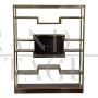 Design bookcase in brass and makassar with central display case