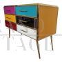 Dresser with six colored glass drawers