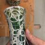 Triptych of Art Nouveau vases in green glass and silver, 1930s