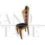 Design chair in briarwood and black leather with fan-shaped backrest