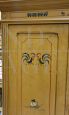 Decorated small vintage wardrobe from the early 20th century