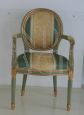 Pair of Louis Philippe style upholstered and green and gold lacquered armchairs
