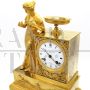 Empire Parisian clock in gilt bronze, signed and dated 1819
