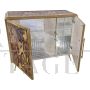 Illuminated glass sideboard with bark pattern