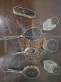 Antique toilet set with silver and tortoiseshell brushes, mirror and bottles                            