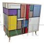 Vintage style sideboard with two colored glass doors