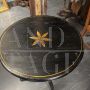 Small antique Tuscan round table, lacquered in black with gold details, early 19th century