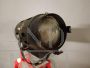 Small vintage cinema spotlight with tripod