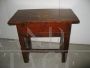 Antique rustic side table in solid walnut