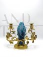 Vintage gilt bronze candlestick with blue porcelain parrot