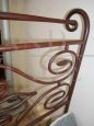 Antique single bed in wrought iron
