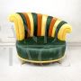 Pair of multicolored round design armchairs with asymmetrical backrest