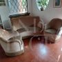 1950s lounge with sofa and armchairs in beige velvet