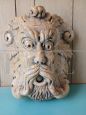 Antique style mask in royal yellow marble