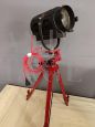 Small vintage cinema spotlight with tripod