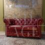English red Chesterfield sofa