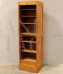 Small office bookcase filing cabinet with single rolling shutter in oak