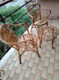 Set of two vintage wicker armchairs and coffee table