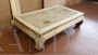 Low coffee table with sackcloth surface