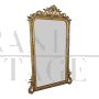 Antique 19th century mirror in carved and gilded wood