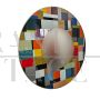 Large round mirror in multicolored glass