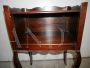 Small vintage bedside table in classic style with open compartment