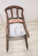 Antique single chair from the 19th century covered in peach colored velvet