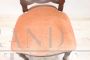 Antique single chair from the 19th century covered in peach colored velvet