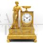 Empire Parisian clock in gilt bronze, signed and dated 1819