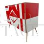 Sideboard with white and red glass geometries